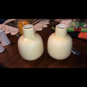 2 Cream colored vases